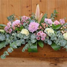 Pastel Funeral casket spray